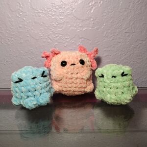 Crochet axolotl and frogs